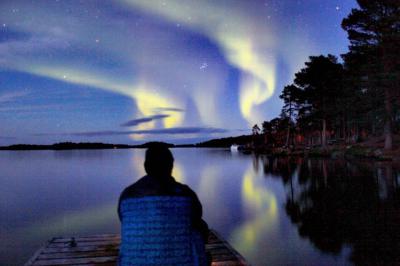 Finlandia - Ruska bajo la aurora boreal